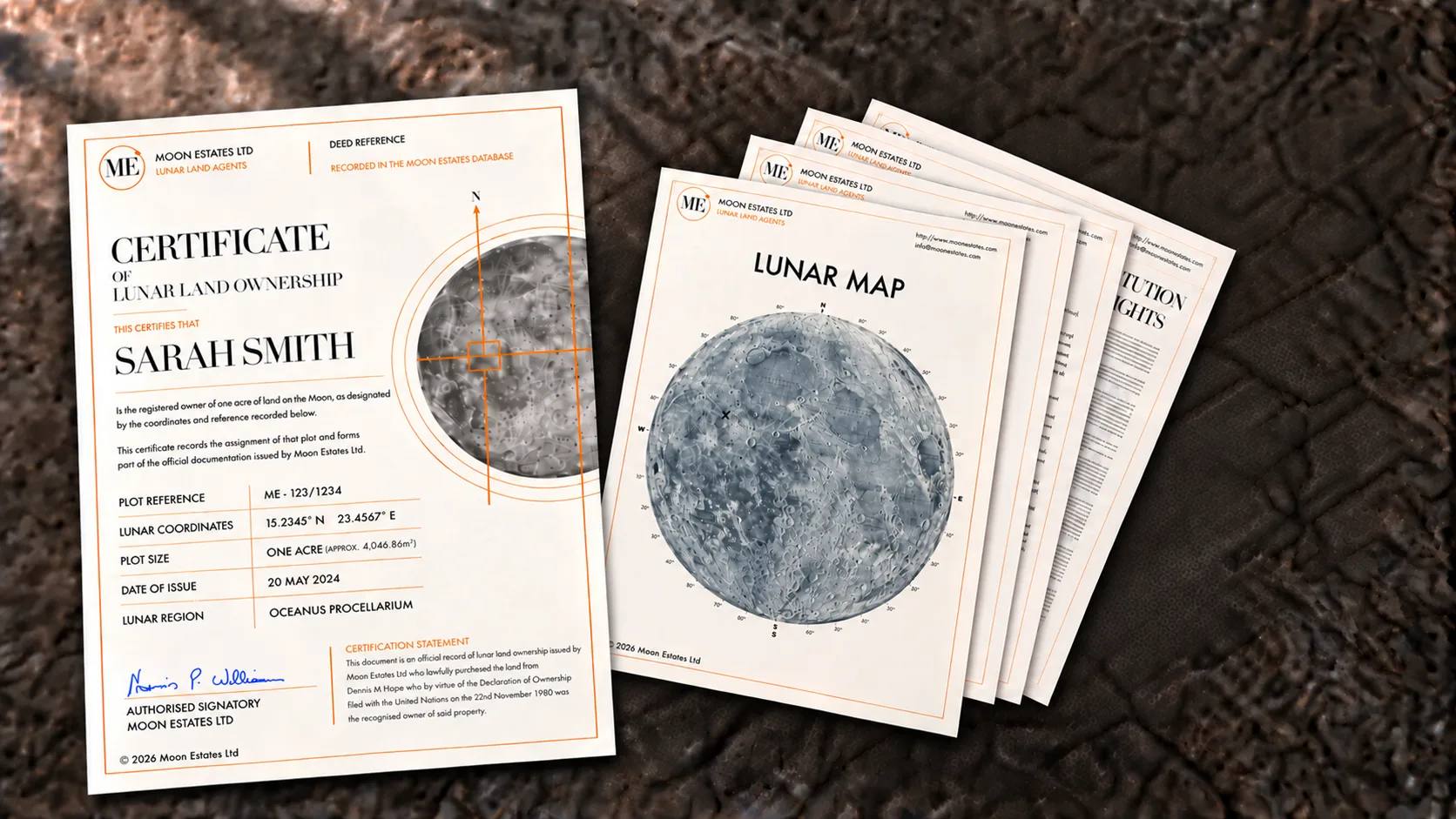 A Moon Estates certificate of lunar land ownership fanned out with a printed lunar map and further documents on a lunar surface.